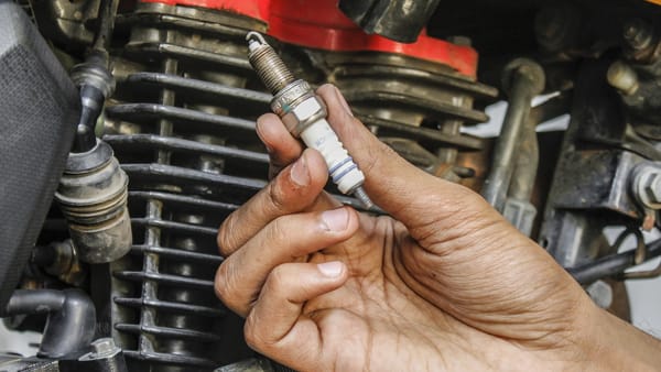 Motorcycle Inspection and cleaning of spark plugs